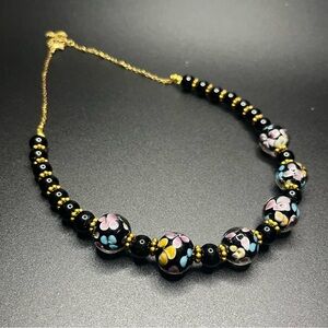 vintage Murano-style glass bead necklace with gold tone findings. Beautiful!